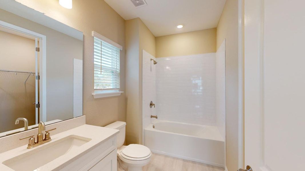 Representative furnished interior of a home built from the Barbuda by Taylor Morrison in Headwaters at Lofton Creek, Yulee (Image 16).