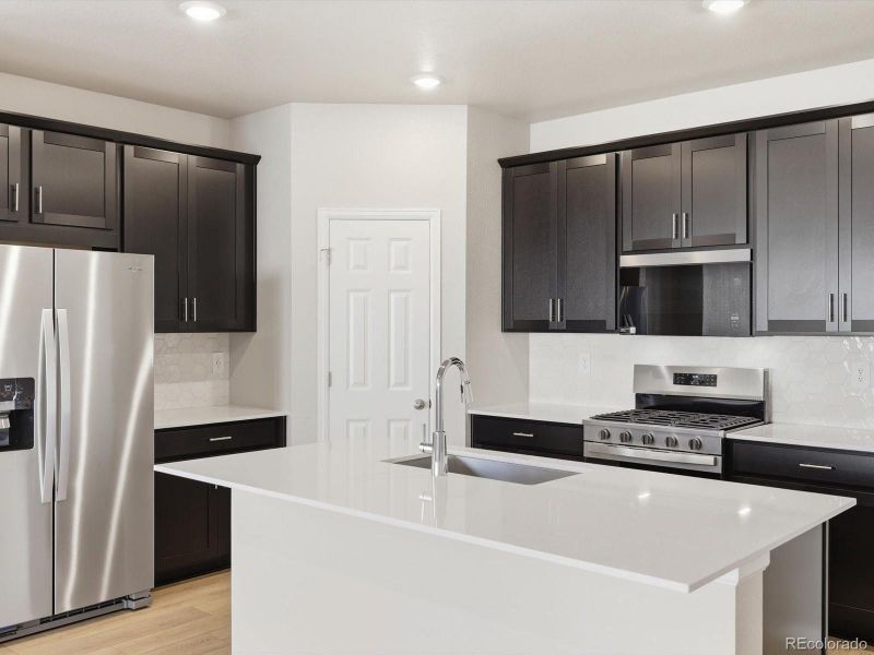 Furnished interior view inside a new home in , Commerce City (Image 8).