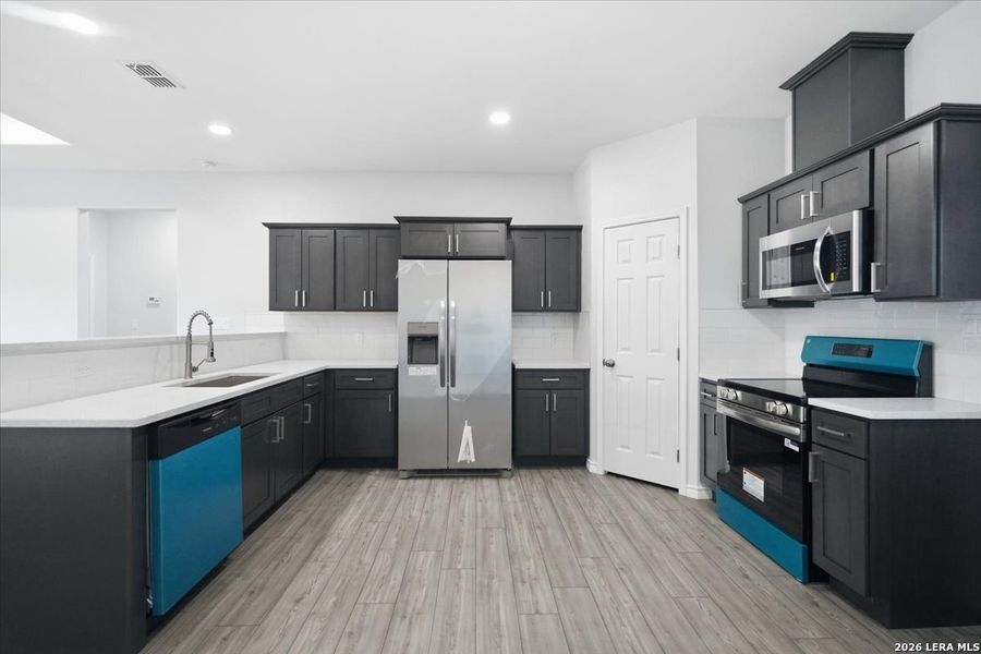 Furnished interior view inside a new home in , Beeville (Image 5).