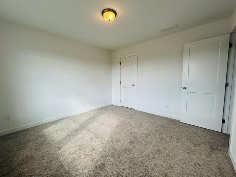 Spacious, unfurnished interior of a new home in Sutton's Landing, Statham (Image 9).