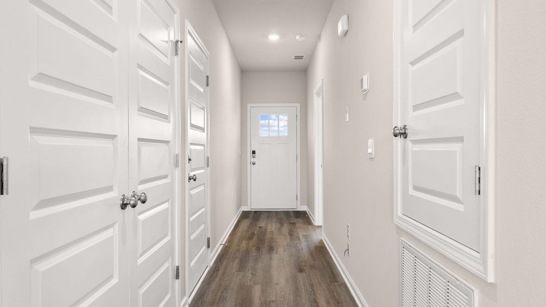 Representative unfurnished interior of a home built from the The Eldridge by D.R. Horton in Liberty, Panama City (Image 13).