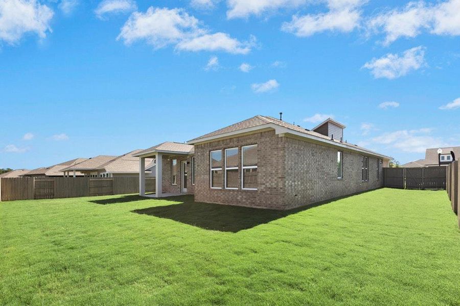 Front exterior of a new home in The Colony, Bastrop, TX, highlighting curb appeal (Image 20).