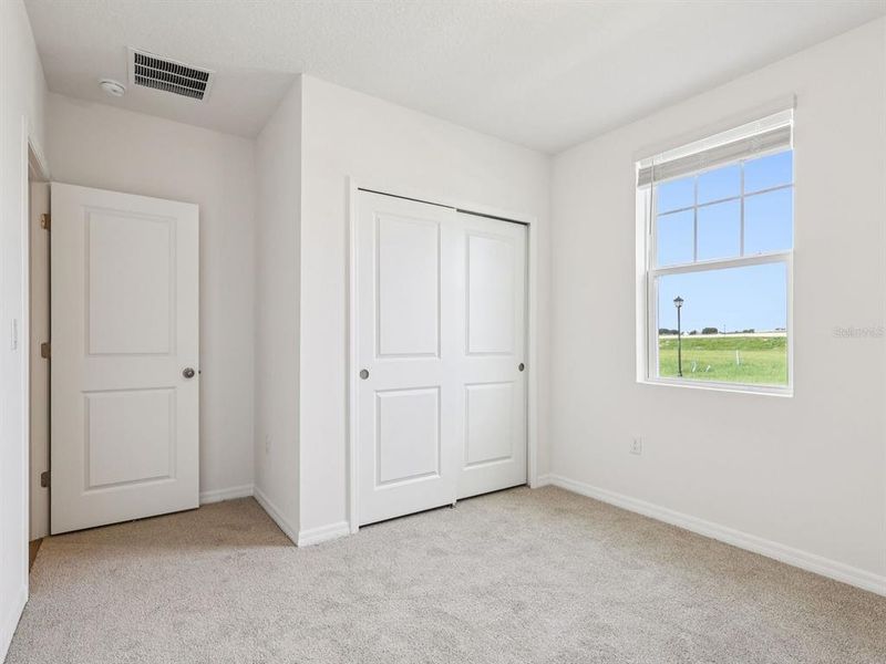 Spacious, unfurnished interior of a new home in Salt Meadows - Classic Series, Parrish (Image 16).