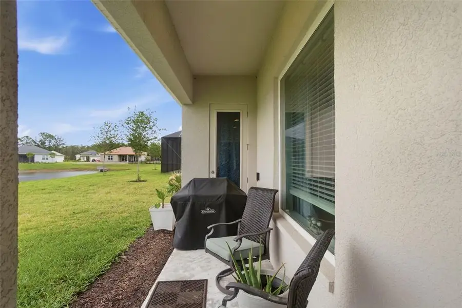 Exterior details and patio area of a home in , Deland (Image 3).