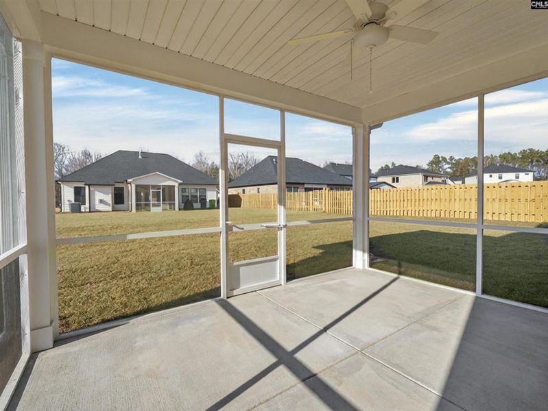Exterior details and patio area of a home in Collins Cove, Chapin (Image 4).
