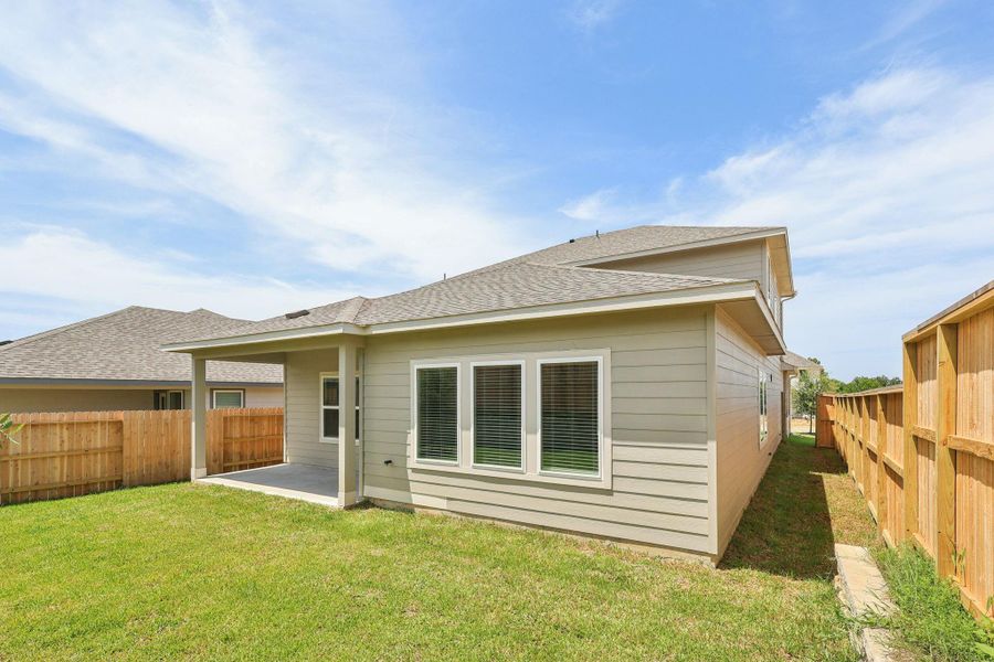 Front exterior of a new home in Pine Lake Cove - Premier Series, Montgomery, TX, highlighting curb appeal (Image 5). Front exterior of a new home in Pine Lake Cove - Premier Series, Montgomery, TX, highlighting curb appeal (Image 5).