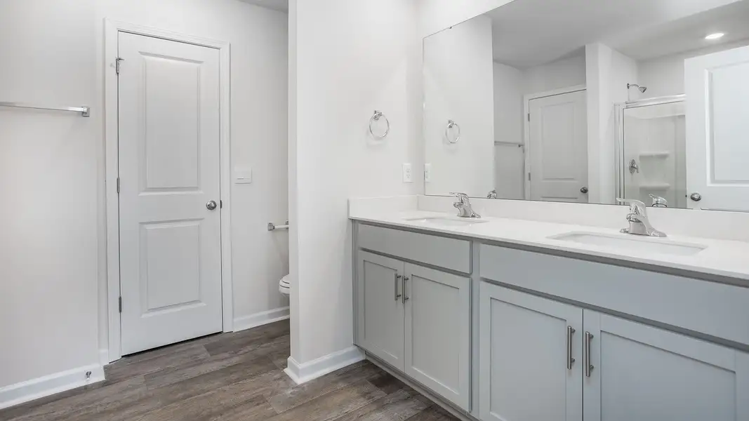 Representative furnished interior of a home built from the Maywood by D.R. Horton in The Townes at Riley's Meadow, Haw River (Image 5).