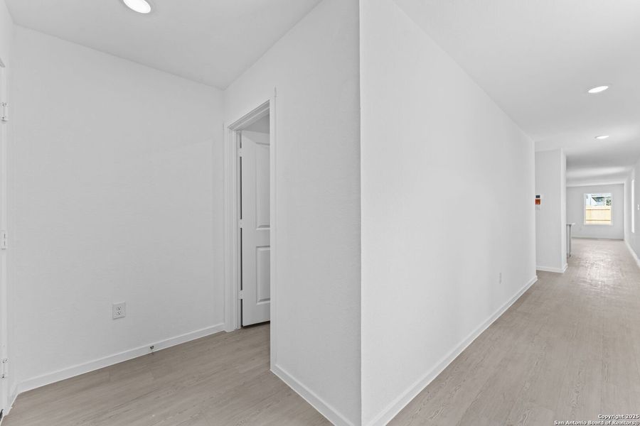 Spacious, unfurnished interior of a new home in Torian Village: Belmar Collection, San Antonio (Image 12).