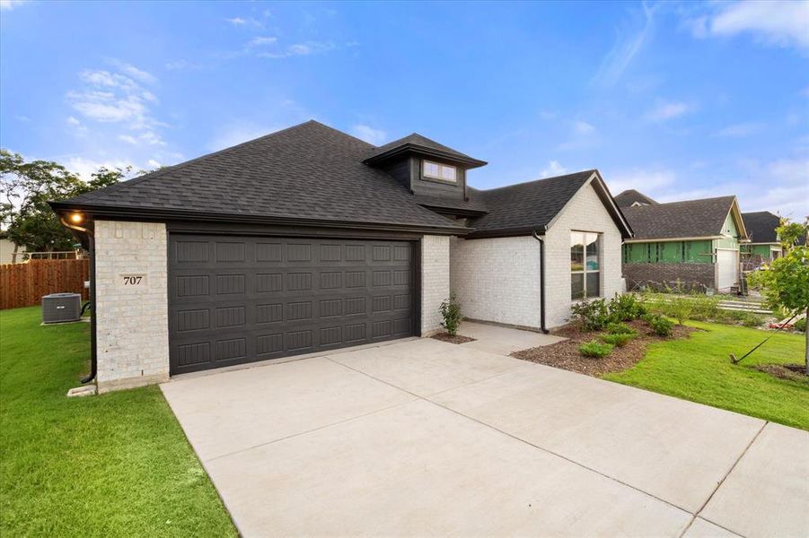 Front exterior of a new home in , Italy, TX, highlighting curb appeal (Image 25).