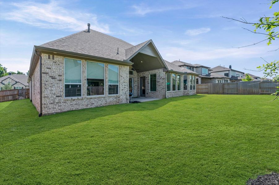 Exterior details and patio area of a home in , Fulshear (Image 25).