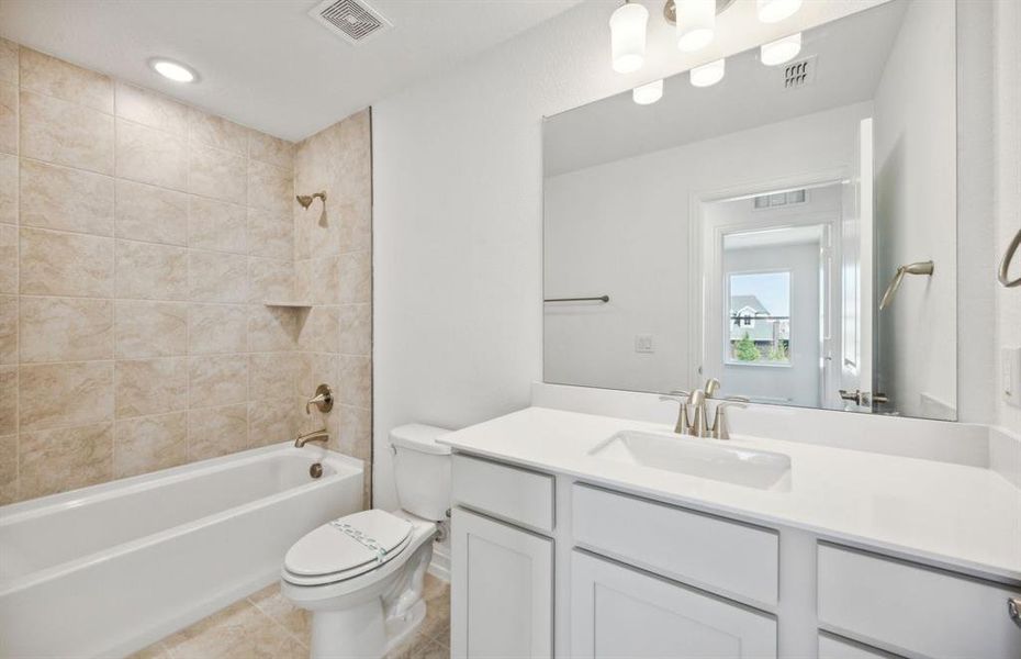 Spacious secondary bathroom*real home pictured