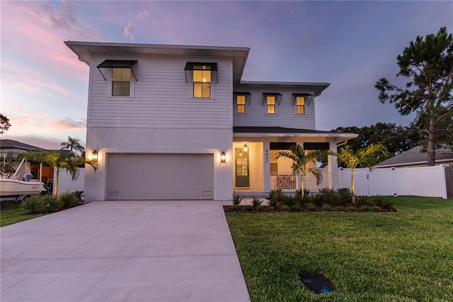 Front exterior of a new home in , Tampa, FL, highlighting curb appeal (Image 32). Front exterior of a new home in , Tampa, FL, highlighting curb appeal (Image 32).