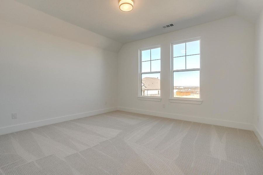 Representative unfurnished interior of a home built from the Eleanor by Graham Hart Home Builder in Sweetgrass, Haslet (Image 19).