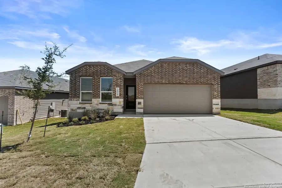 Front exterior of a new home in Waterwheel: Coastline Collection, San Antonio, TX, highlighting curb appeal (Image 2).