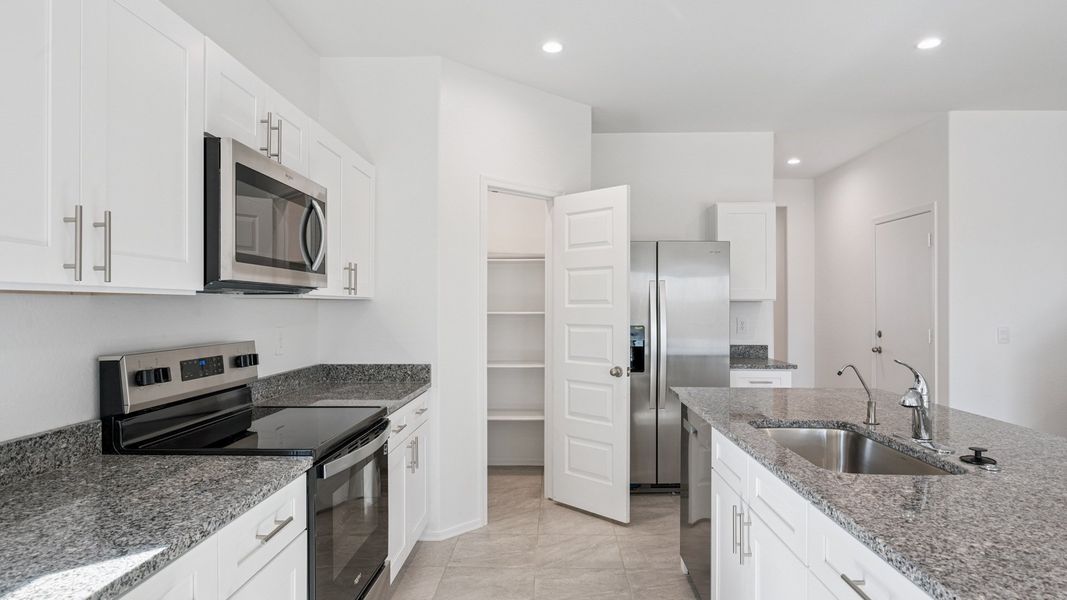 Representative furnished interior of a home built from the Ibis by D.R. Horton in Elena Trails, Maricopa (Image 8).