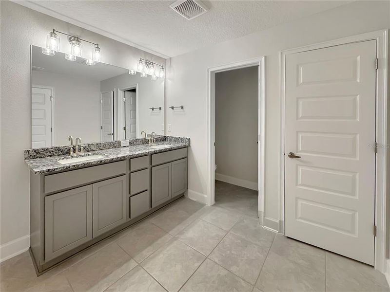 Furnished interior view inside a new home in Harmony Central, Harmony (Image 3).