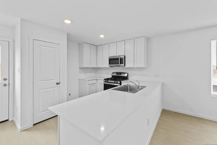Furnished interior view inside a new home in Spring Grove, San Antonio (Image 6).