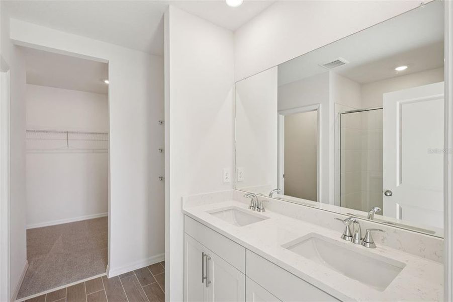 Furnished interior view inside a new home in The Grove at Stuart Crossing - Classic Series, Bartow (Image 5).