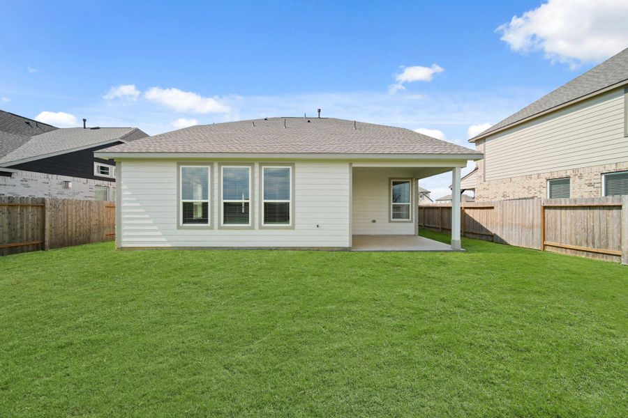 Front exterior of a new home in Beacon Hill, Waller, TX, highlighting curb appeal (Image 1). Front exterior of a new home in Beacon Hill, Waller, TX, highlighting curb appeal (Image 1).