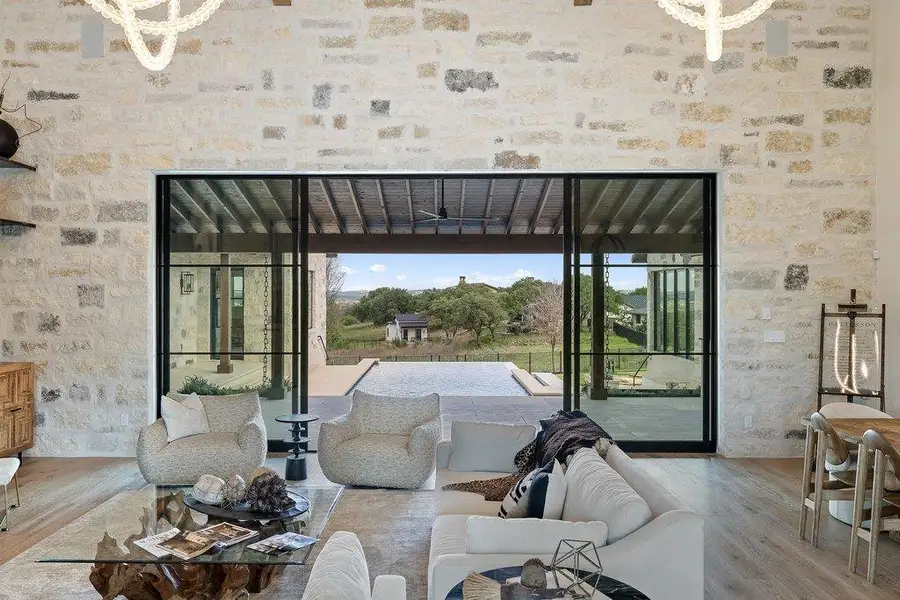 Exterior details and patio area of a home in , Spicewood (Image 23).
