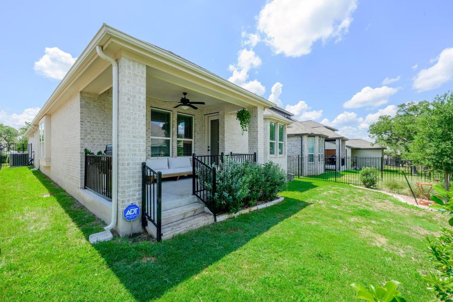 Front exterior of a new home in , Kyle, TX, highlighting curb appeal (Image 22).