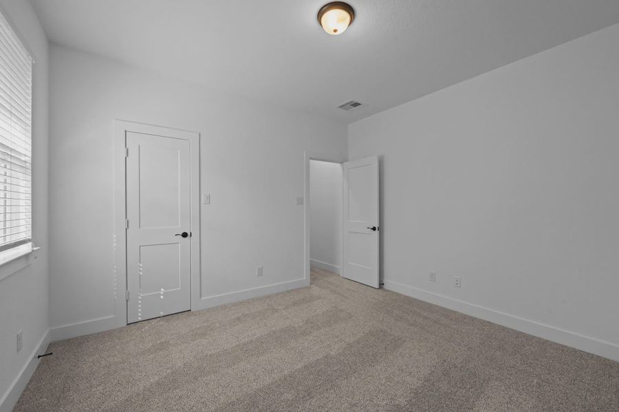 Spacious, unfurnished interior of a new home in The Woodlands Hills, Willis (Image 14).