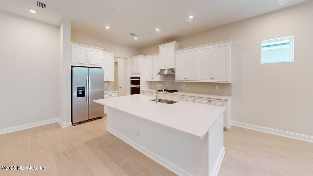 Furnished interior view inside a new home in RiverTown - WaterSong, St. Johns (Image 6). Furnished interior view inside a new home in RiverTown - WaterSong, St. Johns (Image 6).