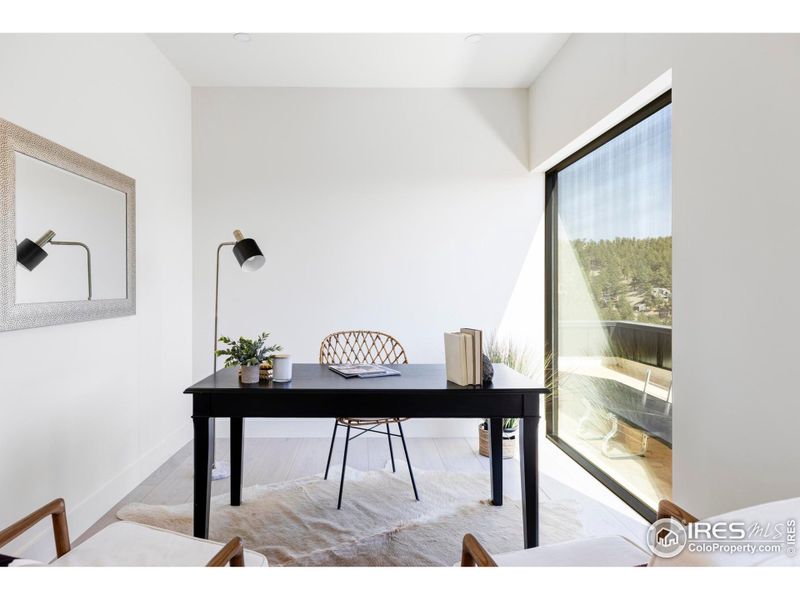 The private home office on the upper level could easily serve as a dressing or sitting room. The private home office on the upper level could easily serve as a dressing or sitting room.