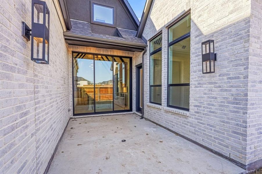Exterior details and patio area of a home in Mustang Lakes, Celina (Image 2). Exterior details and patio area of a home in Mustang Lakes, Celina (Image 2).