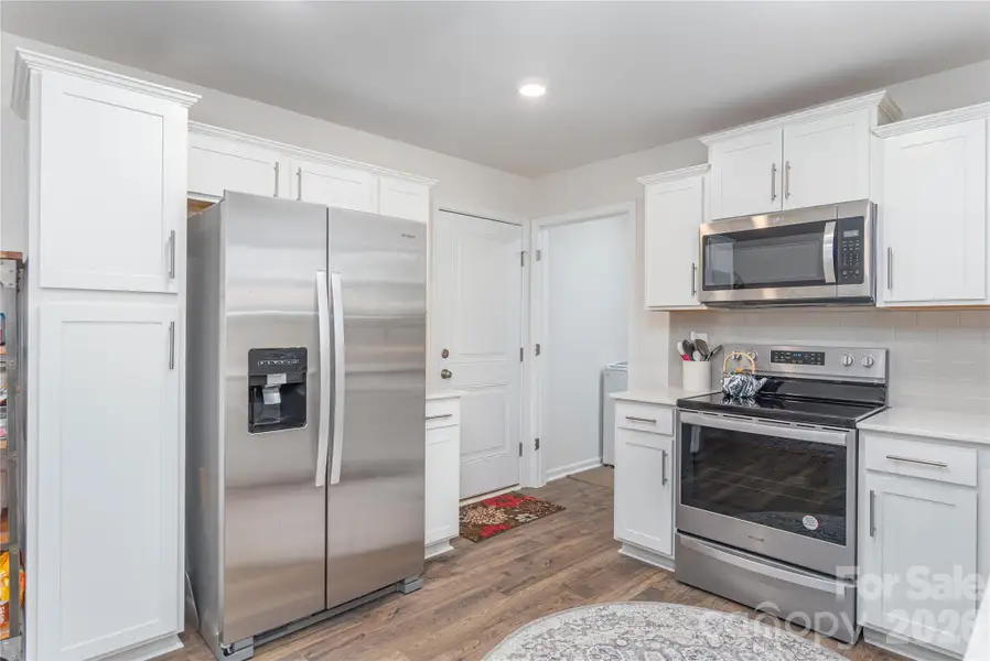 Furnished interior view inside a new home in , Candler (Image 7).