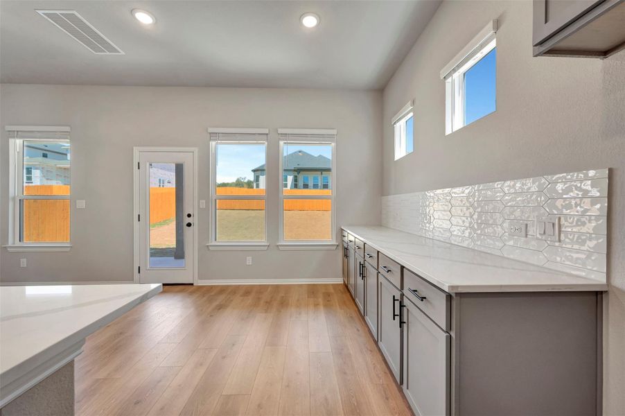 Furnished interior view inside a new home in Heritage, Dripping Springs (Image 16).