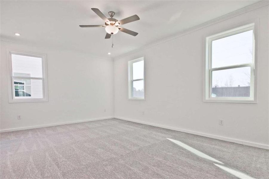 Spacious, unfurnished interior of a new home in The Paddocks at Doc Hughes, Buford (Image 24).