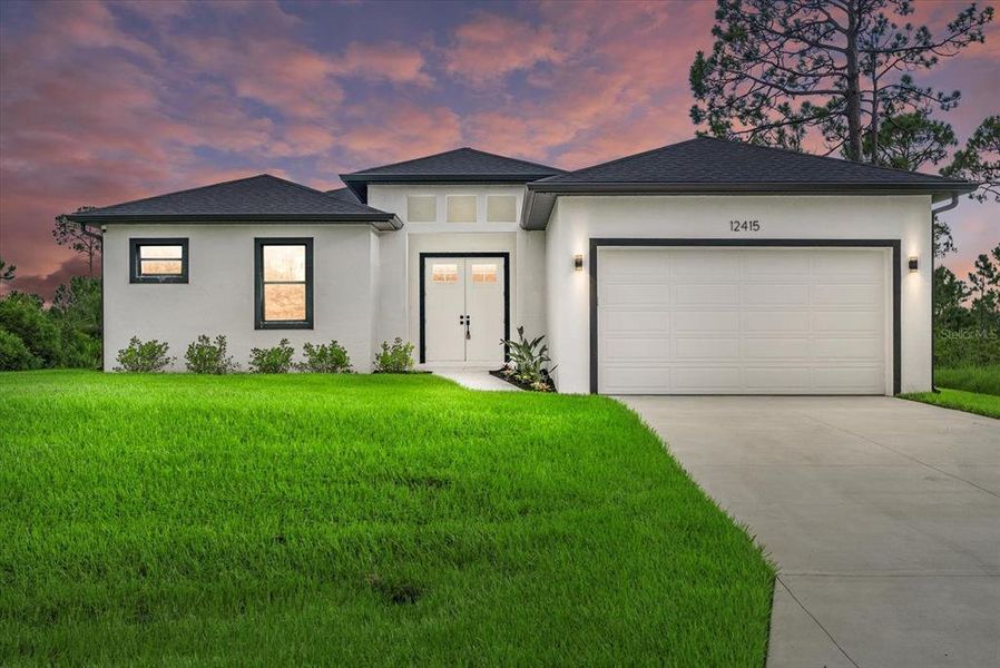Front exterior of a new home in , Port Charlotte, FL, highlighting curb appeal (Image 22). Front exterior of a new home in , Port Charlotte, FL, highlighting curb appeal (Image 22).