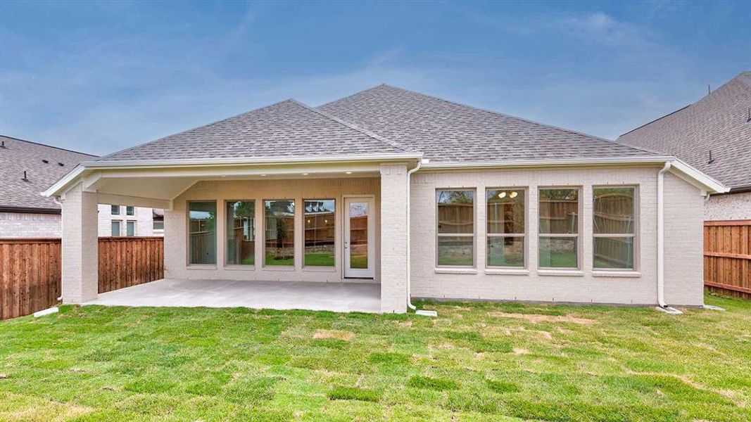 Exterior details and patio area of a home in Walsh Ranch 55', Fort Worth (Image 4).