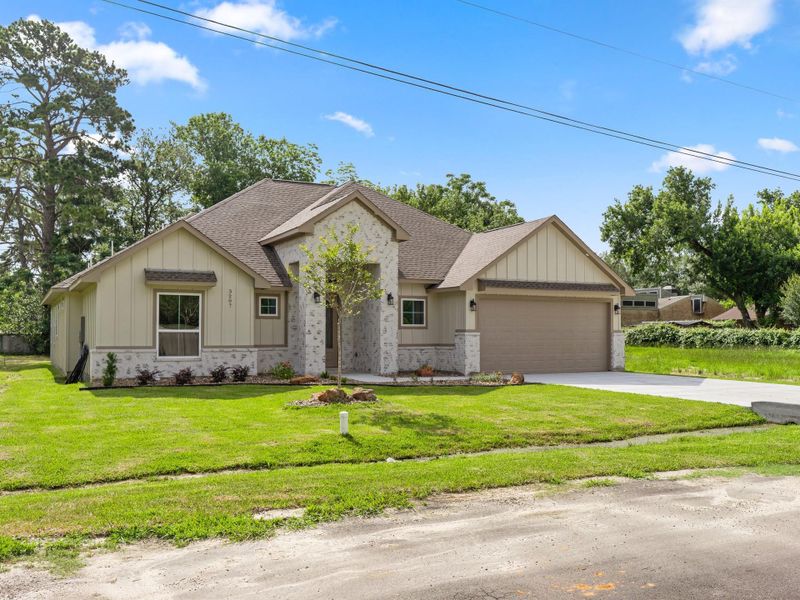 Front exterior of a new home in , Bay City, TX, highlighting curb appeal (Image 16).