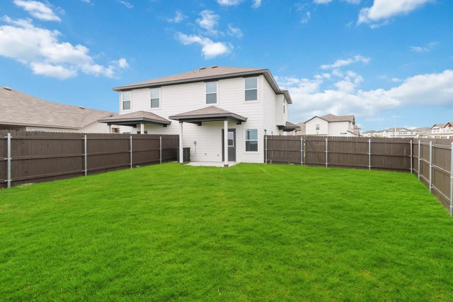 Representative exterior details of a home built from the Duplex 5736 by TwoTen Communities in Emma Park, Buda (Image 3).