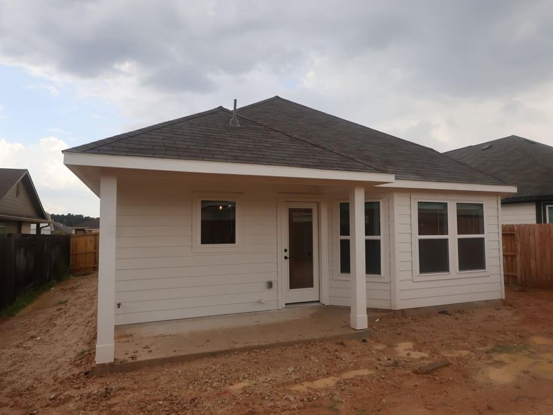 Exterior details and patio area of a home in Magnolia Ridge, Magnolia (Image 4).