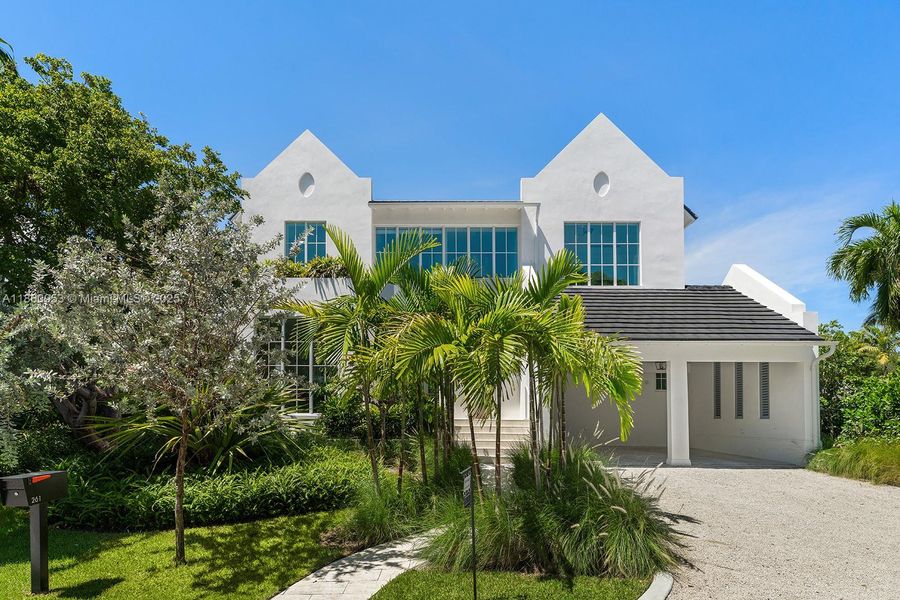 Front exterior of a new home in , Key Biscayne, FL, highlighting curb appeal (Image 1). Front exterior of a new home in , Key Biscayne, FL, highlighting curb appeal (Image 1).