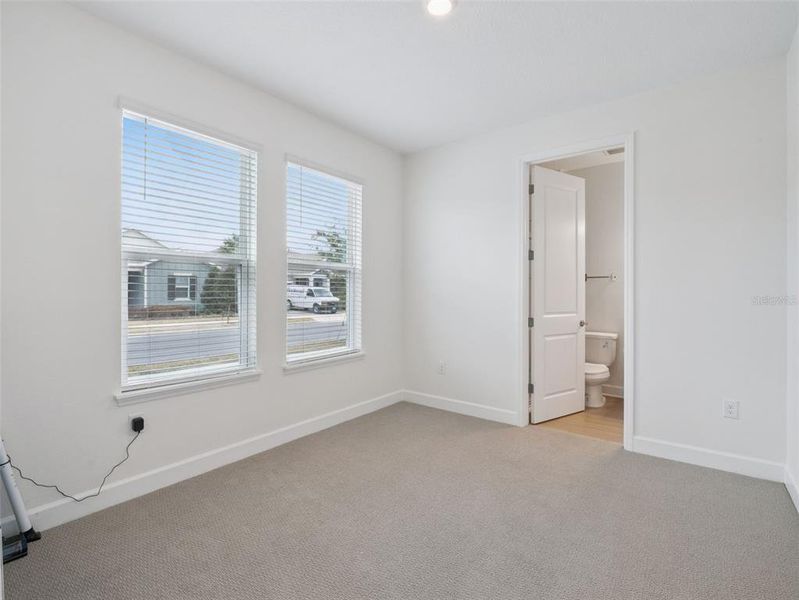 Spacious, unfurnished interior of a new home in Harvest at Ovation, Winter Garden (Image 27).