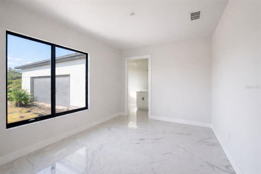 Spacious, unfurnished interior of a new home in , Port Charlotte (Image 22).