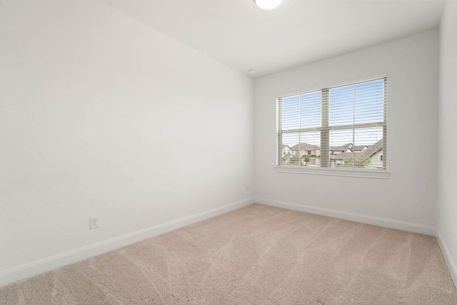 This is one of two bedrooms located on the second floor of the home.