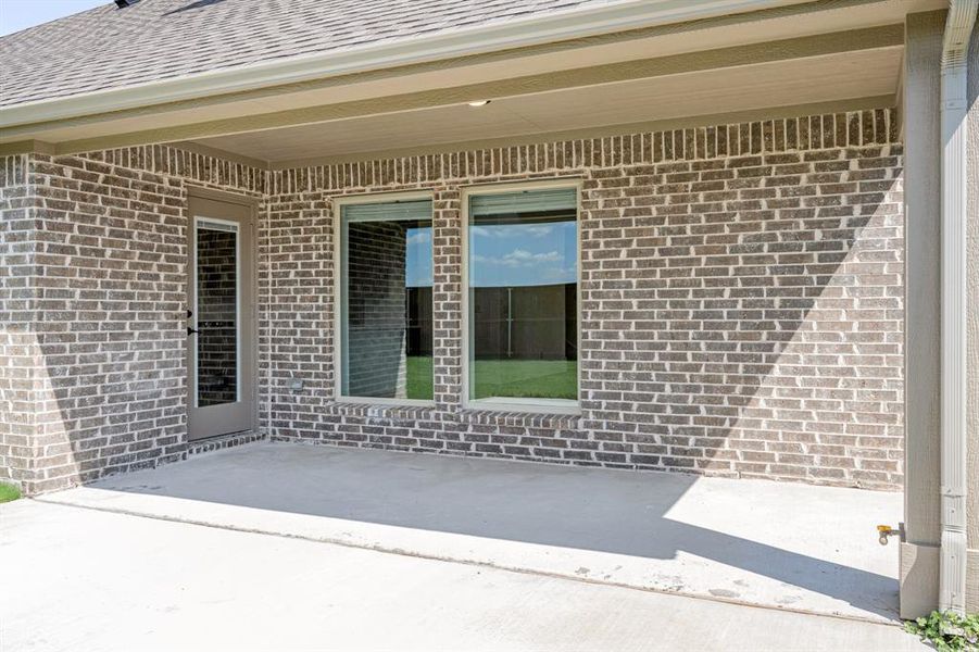 Exterior details and patio area of a home in Terracina, Rockwall (Image 21). Exterior details and patio area of a home in Terracina, Rockwall (Image 21).