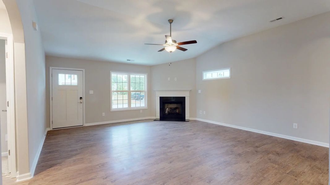 Representative unfurnished interior of a home built from the Kids 2 Car by JC Jackson Homes,LLC in Heritage Pointe, Newport (Image 12).