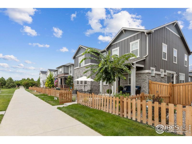 Front exterior of a new home in , Berthoud, CO, highlighting curb appeal (Image 22).