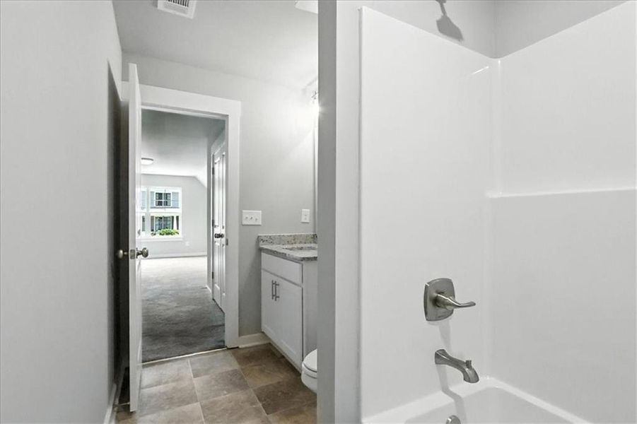 Furnished interior view inside a new home in Traditions of Braselton, Jefferson (Image 14).