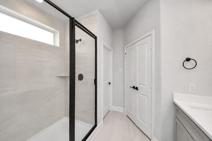Furnished interior view inside a new home in , Conroe (Image 13).