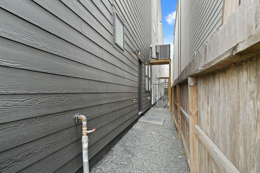 The backyard features a wrought iron fence and space for your pet. The backyard features a wrought iron fence and space for your pet.