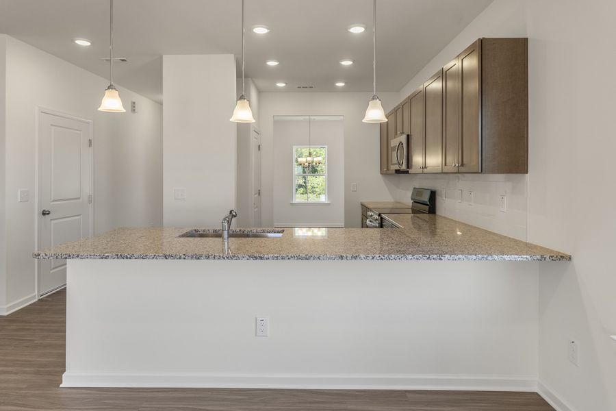 Furnished interior view inside a new home in The Exchange, Vass (Image 6).