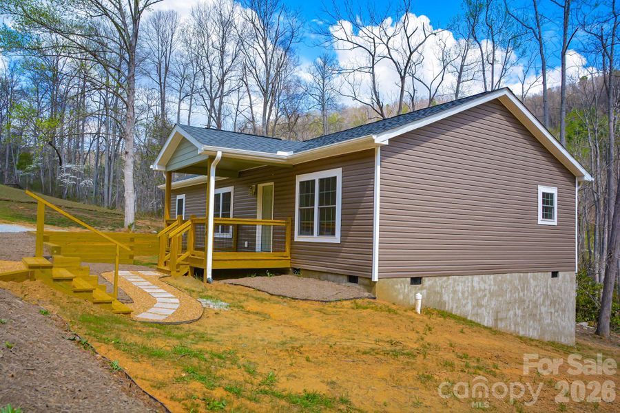Exterior details and patio area of a home in , Hendersonville (Image 14).