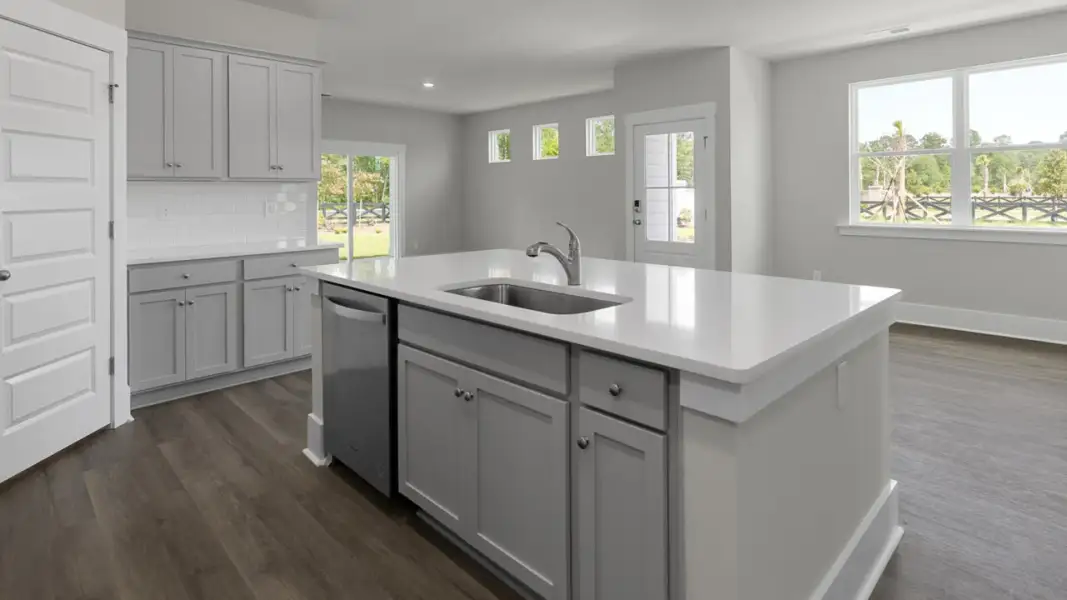 Furnished interior view inside a new home in The Retreat at Indigo Preserve Townhomes, Leland (Image 5).